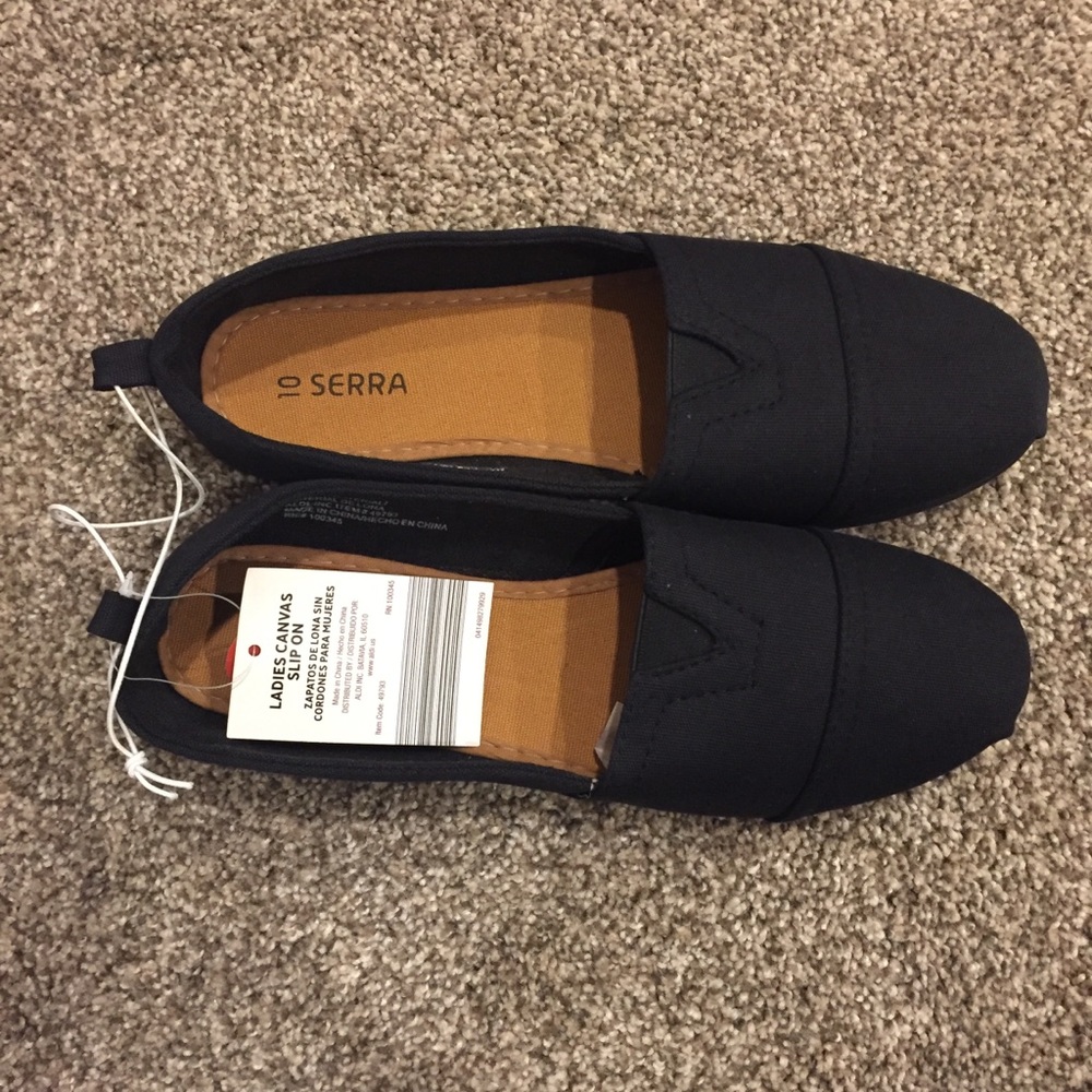 (NEW) Black canvas slip-ons.